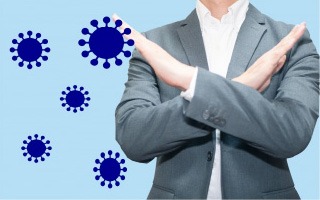ウイルスを示すアイコンの前で利用不可を示すポーズを取る人物